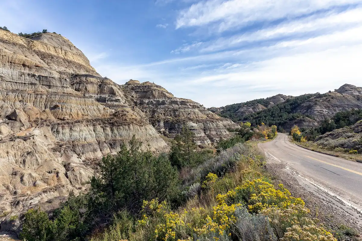 Paved North Unit scenic road winding along badlands rim