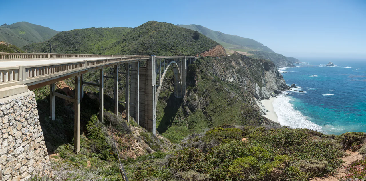Bixby Creek Bridge arching across a canyon on the Big Sur coast with the Pacific beyond
