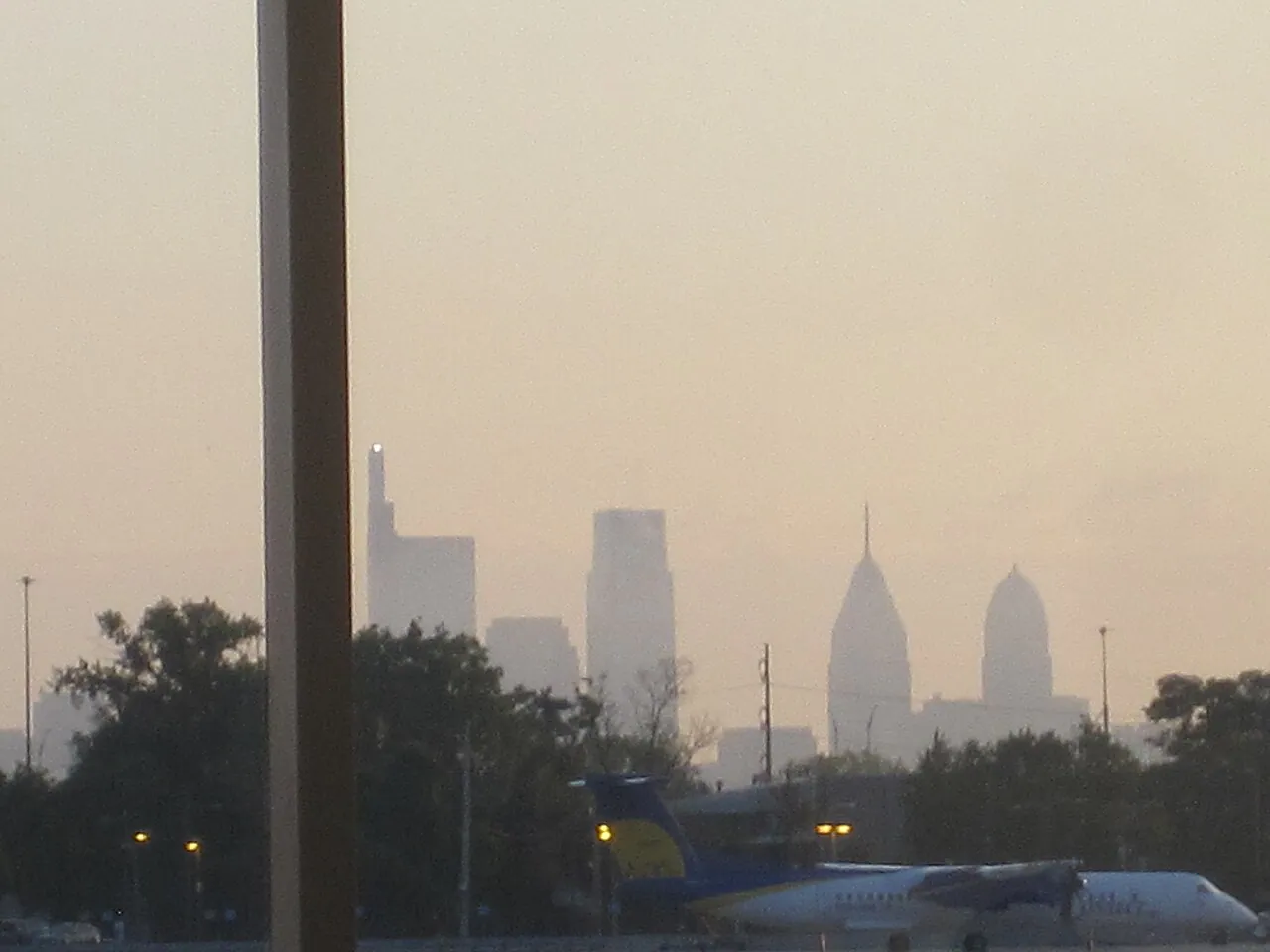 The Philadelphia skyline at dawn with City Hall and the Center City towers catching first light