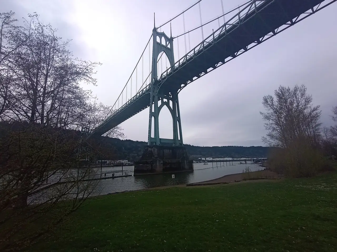 The gothic towers of the St. Johns Bridge seen from Cathedral Park