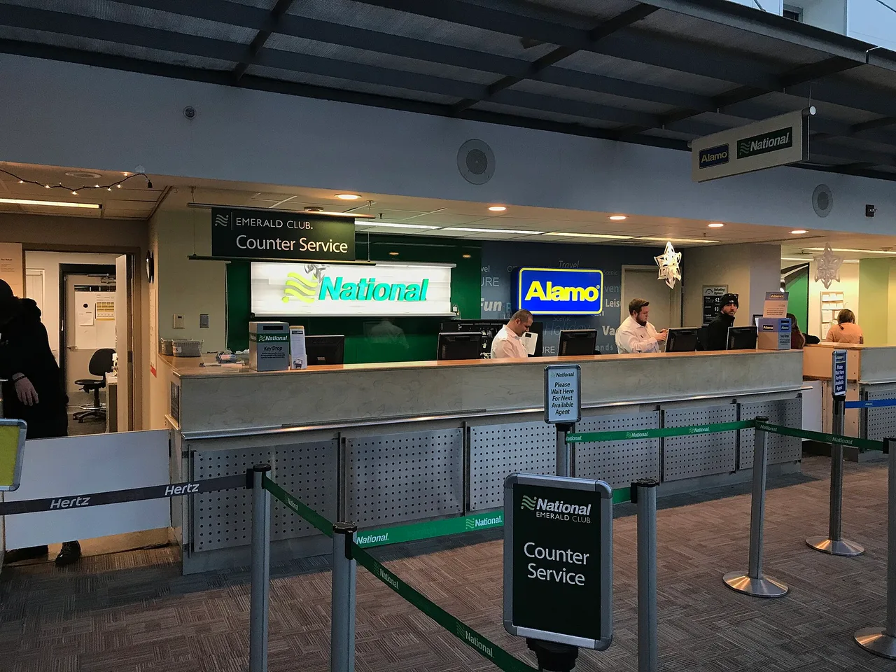 National and Alamo car rental counters side by side at Portland International Jetport