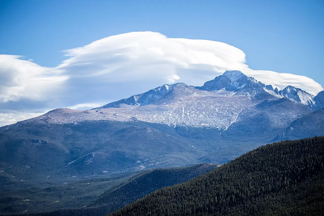 Lenticular clouds forming over Longs Peak in Rocky Mountain National Park