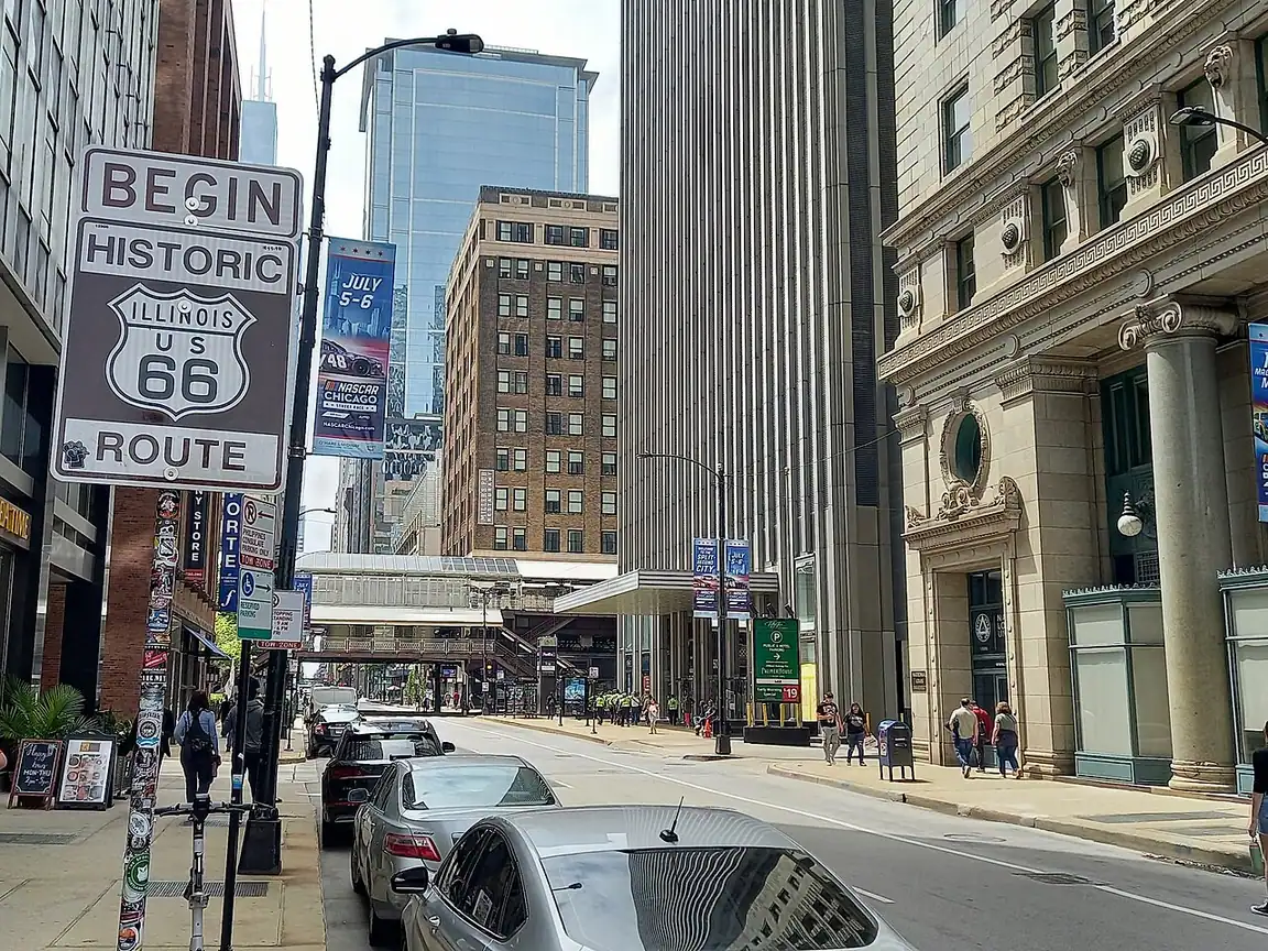 The Begin Historic Route 66 sign on Adams Street in downtown Chicago