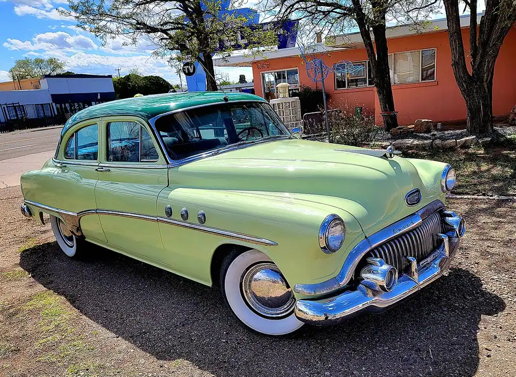 A vintage Buick parked outside the restored Blue Swallow Motel in Tucumcari