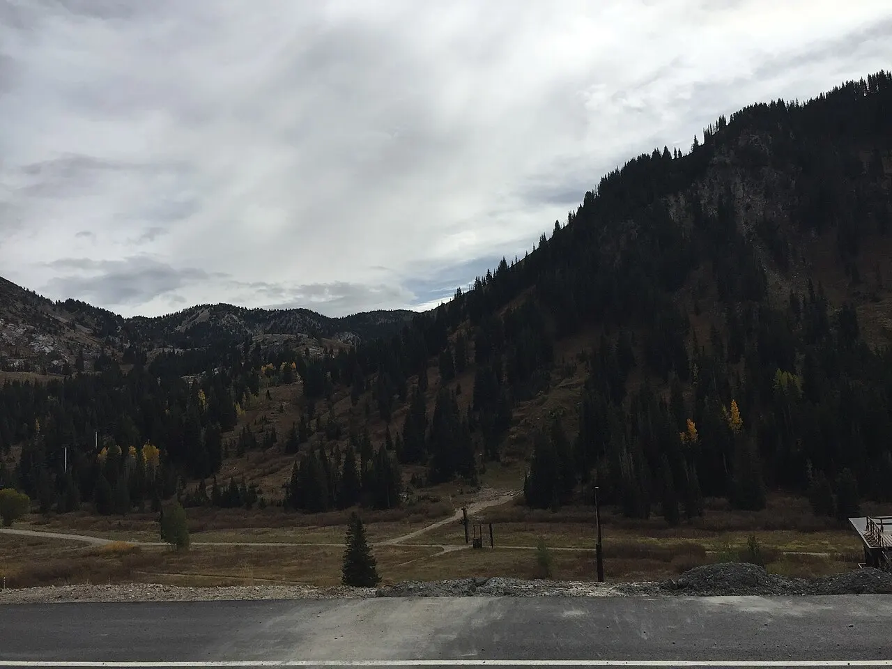 Forested slopes and a mountain ridge along Little Cottonwood Canyon near the Alta Ski Area in Utah