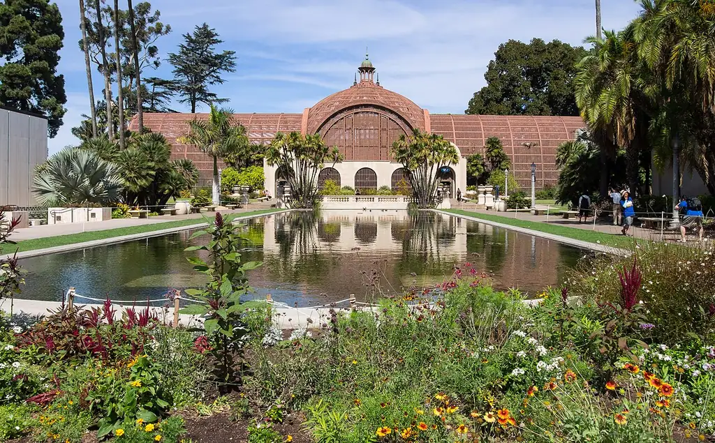 The wooden lath dome of the Botanical Building and its lily pond in Balboa Park, San Diego