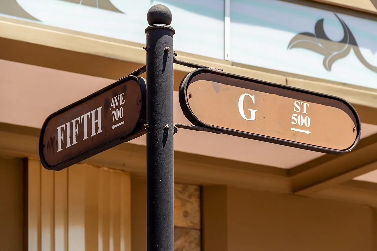 Historic brick buildings and street signs in the Gaslamp Quarter of downtown San Diego