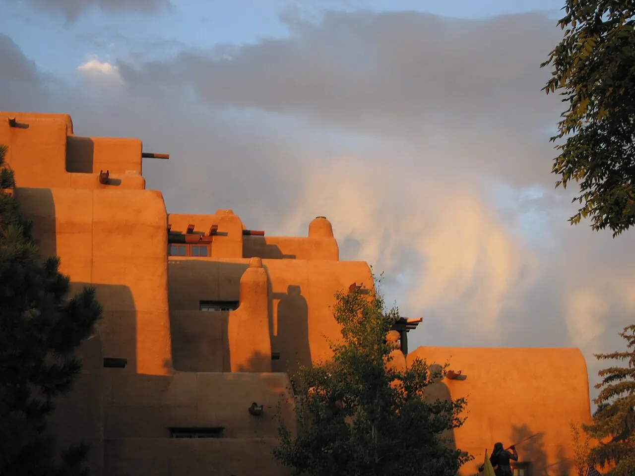 Multi-story adobe hotel facade near the Santa Fe Plaza