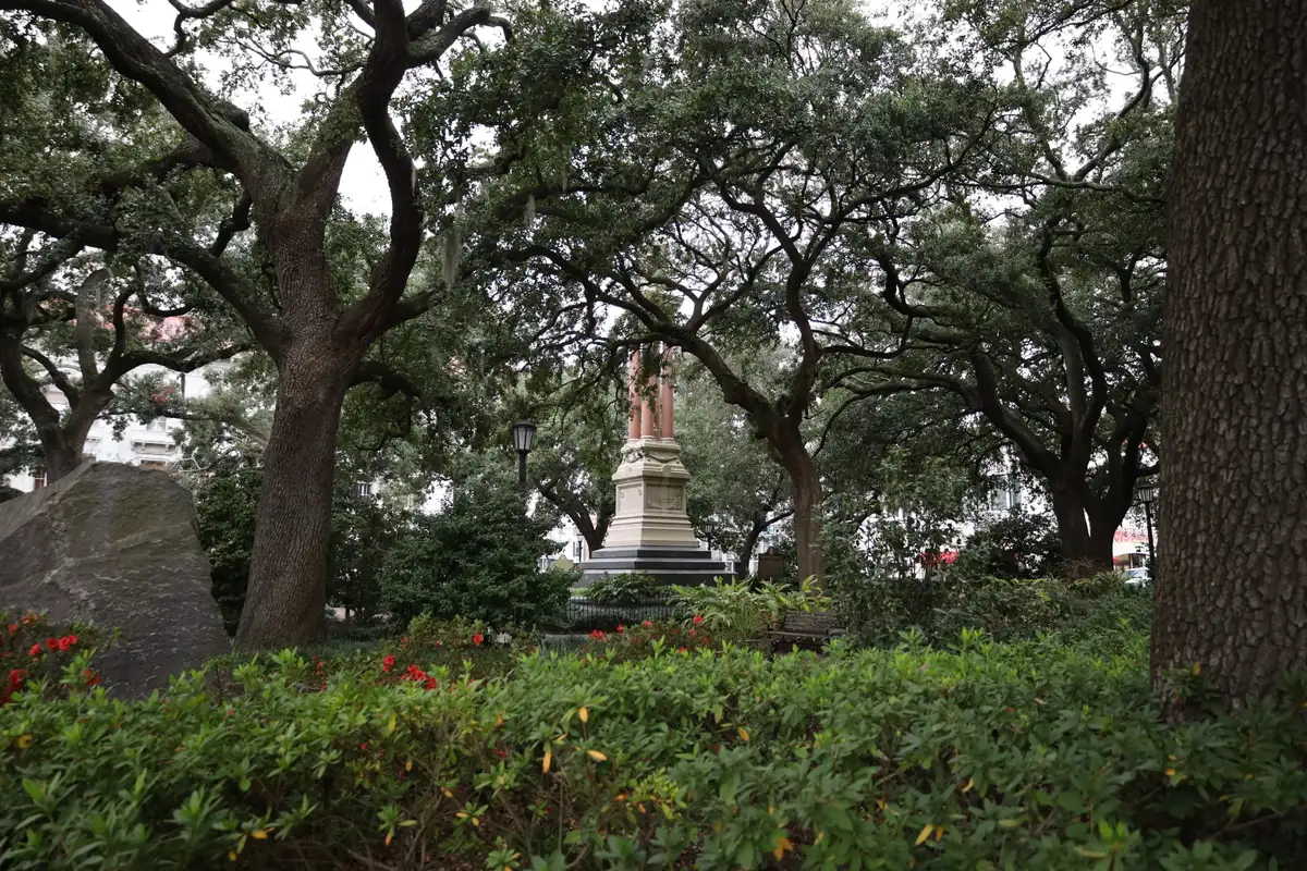 Live oaks and a monument in Wright Square in Savannah's Historic District