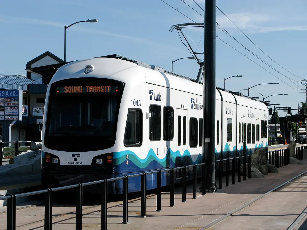 A Sound Transit Link light rail train on an elevated track in the Seattle area
