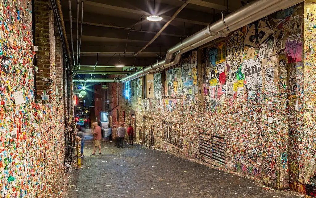 The Gum Wall in Post Alley below Pike Place Market, covered in layers of colored chewing gum