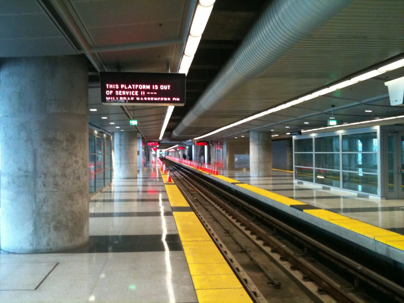 A BART train waiting at the platform of San Francisco International Airport station