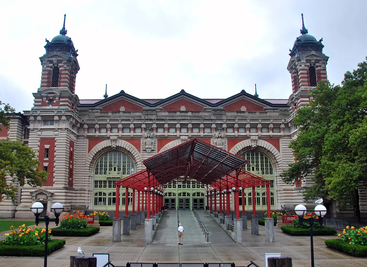 The main immigration building at Ellis Island with its four towers and arched entrance