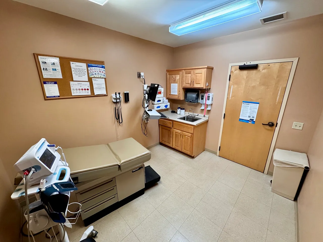 A patient examination room inside a US urgent care clinic
