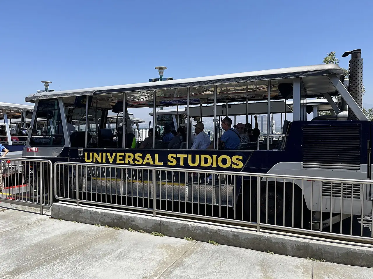 A Studio Tour tram passing through the backlot at Universal Studios Hollywood