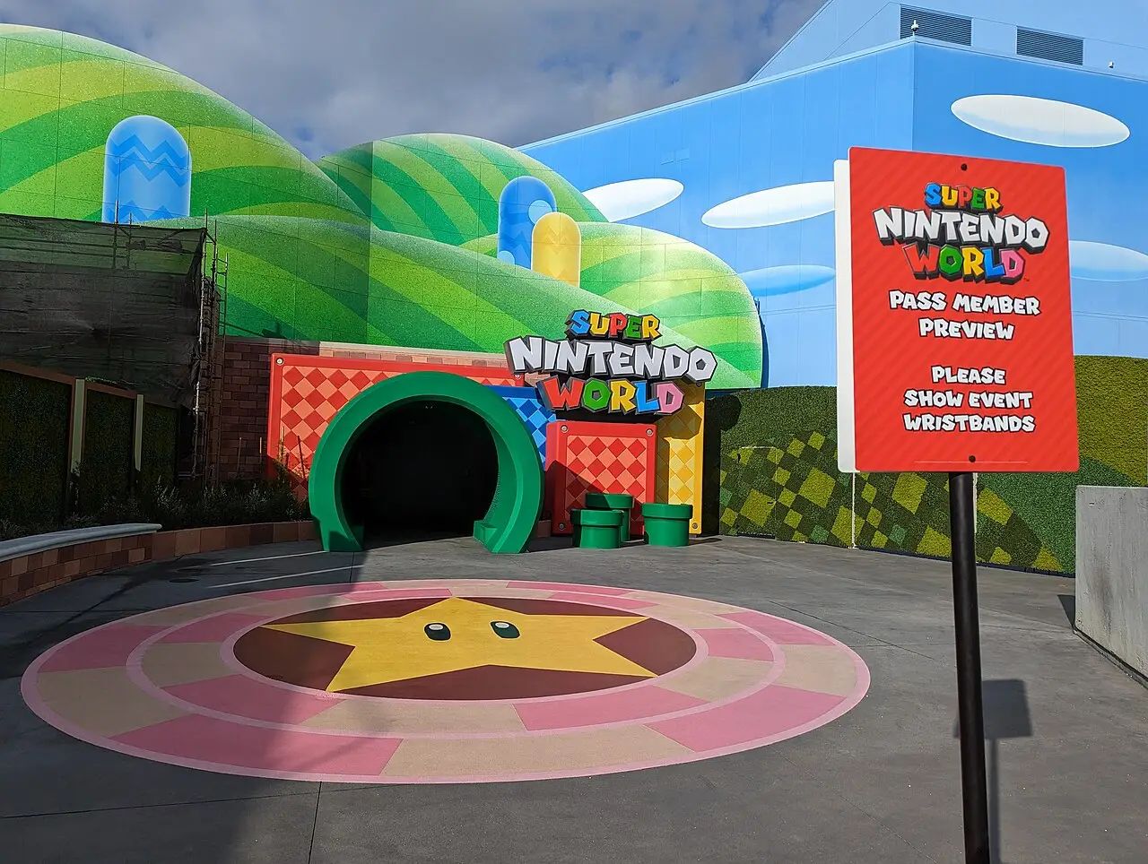 Colorful mushroom-topped buildings and pipes in Super Nintendo World at Universal Studios Hollywood