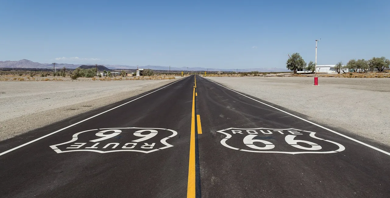 Empty two-lane desert highway on historic Route 66 near Amboy, California