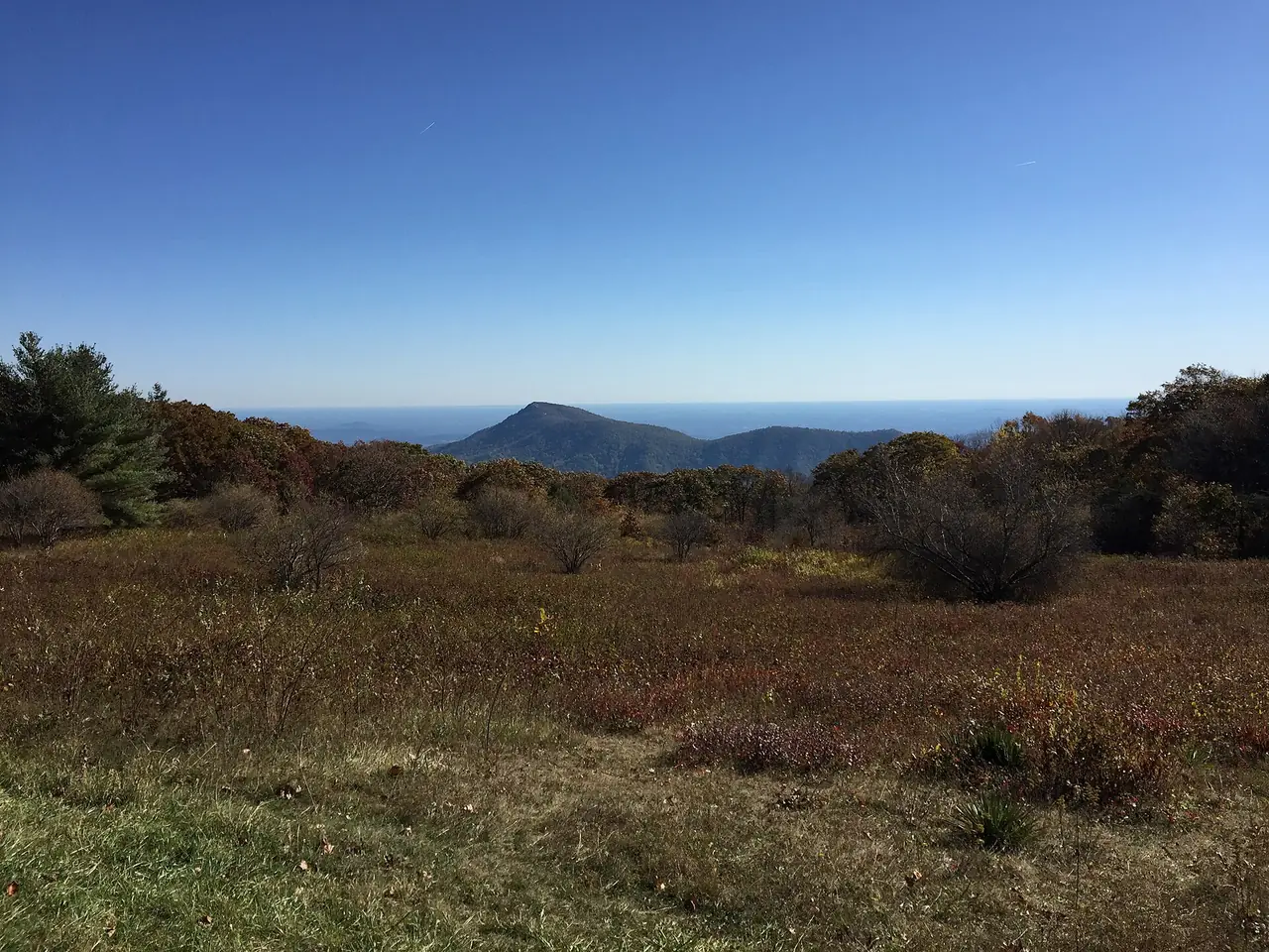 The rocky summit of Old Rag Mountain seen from the Old Rag View Overlook on Skyline Drive in fall