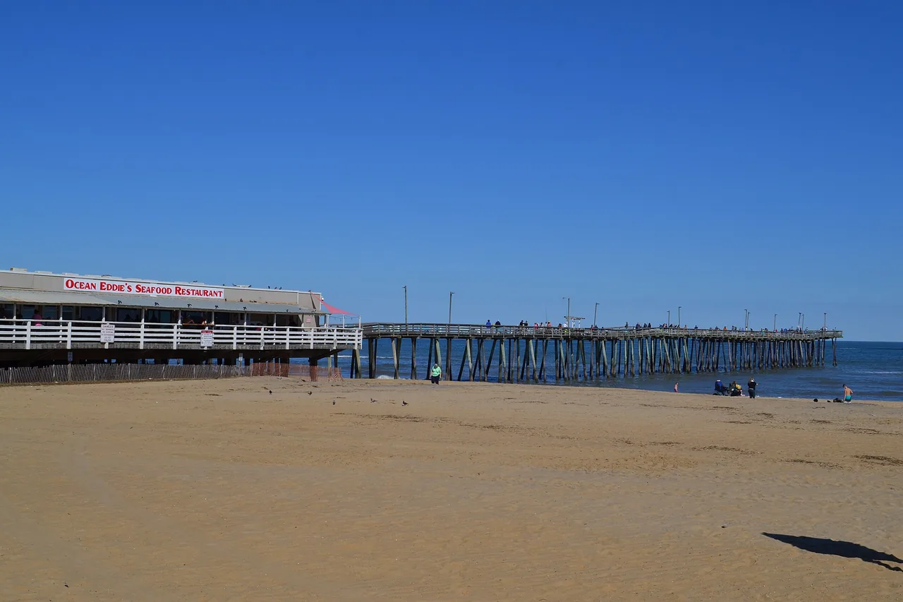The fishing pier and its restaurant on the sand at the Virginia Beach oceanfront