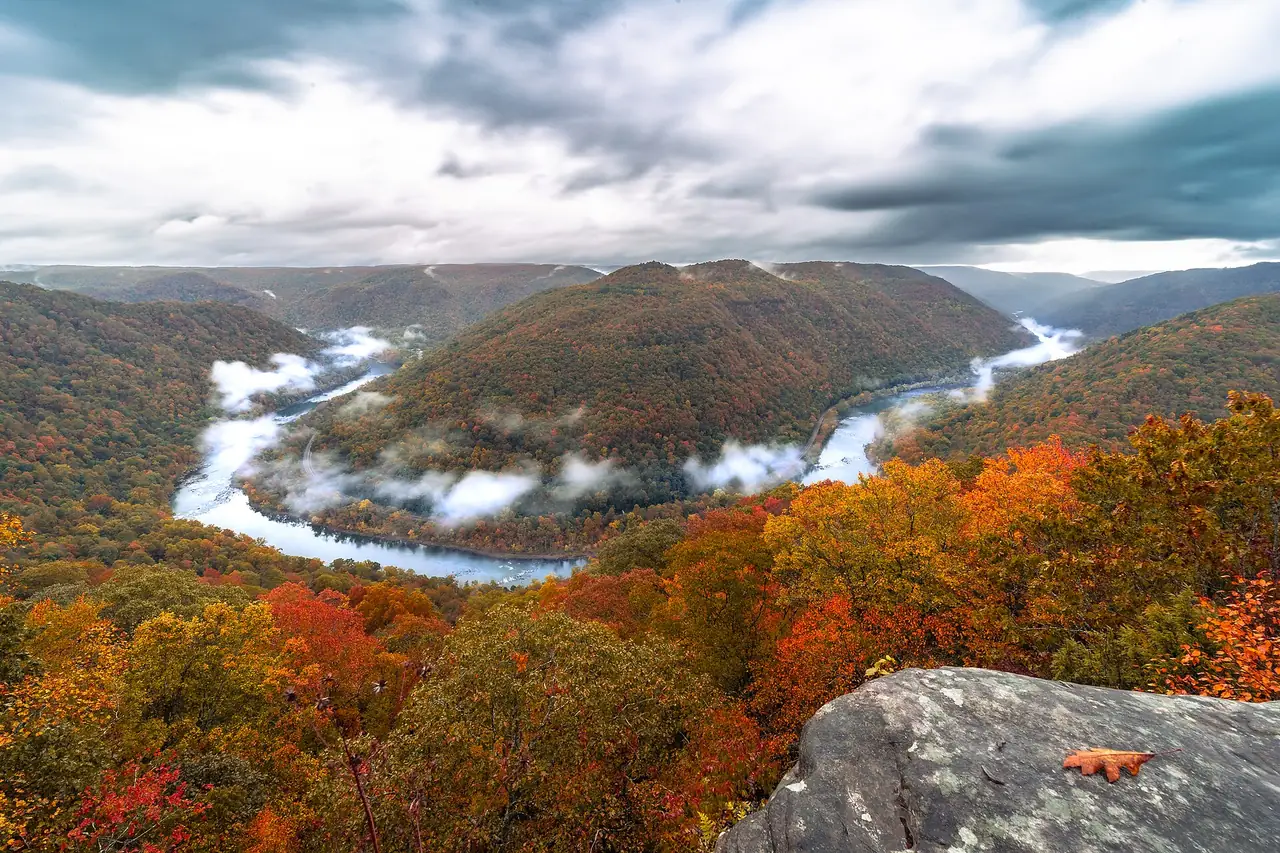 Evening light and mist over forested ridges at Grandview in New River Gorge