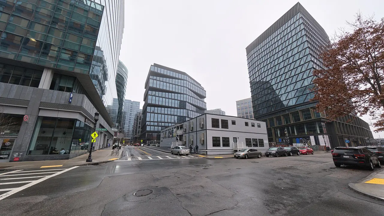 Glass office towers and wide empty streets at Boston Wharf Road in the Seaport district