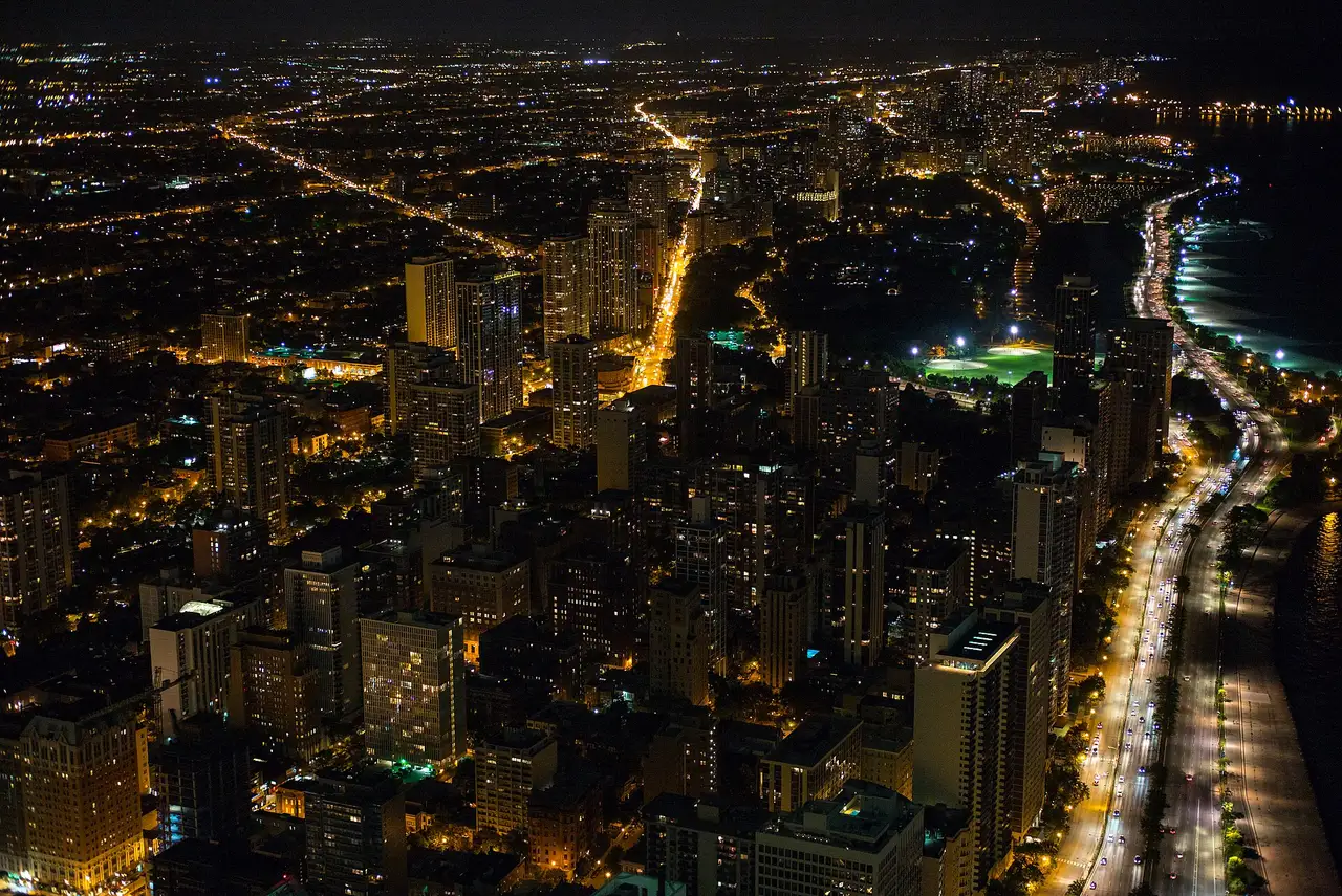 Aerial night view of the Gold Coast and Lincoln Park along Lake Shore Drive