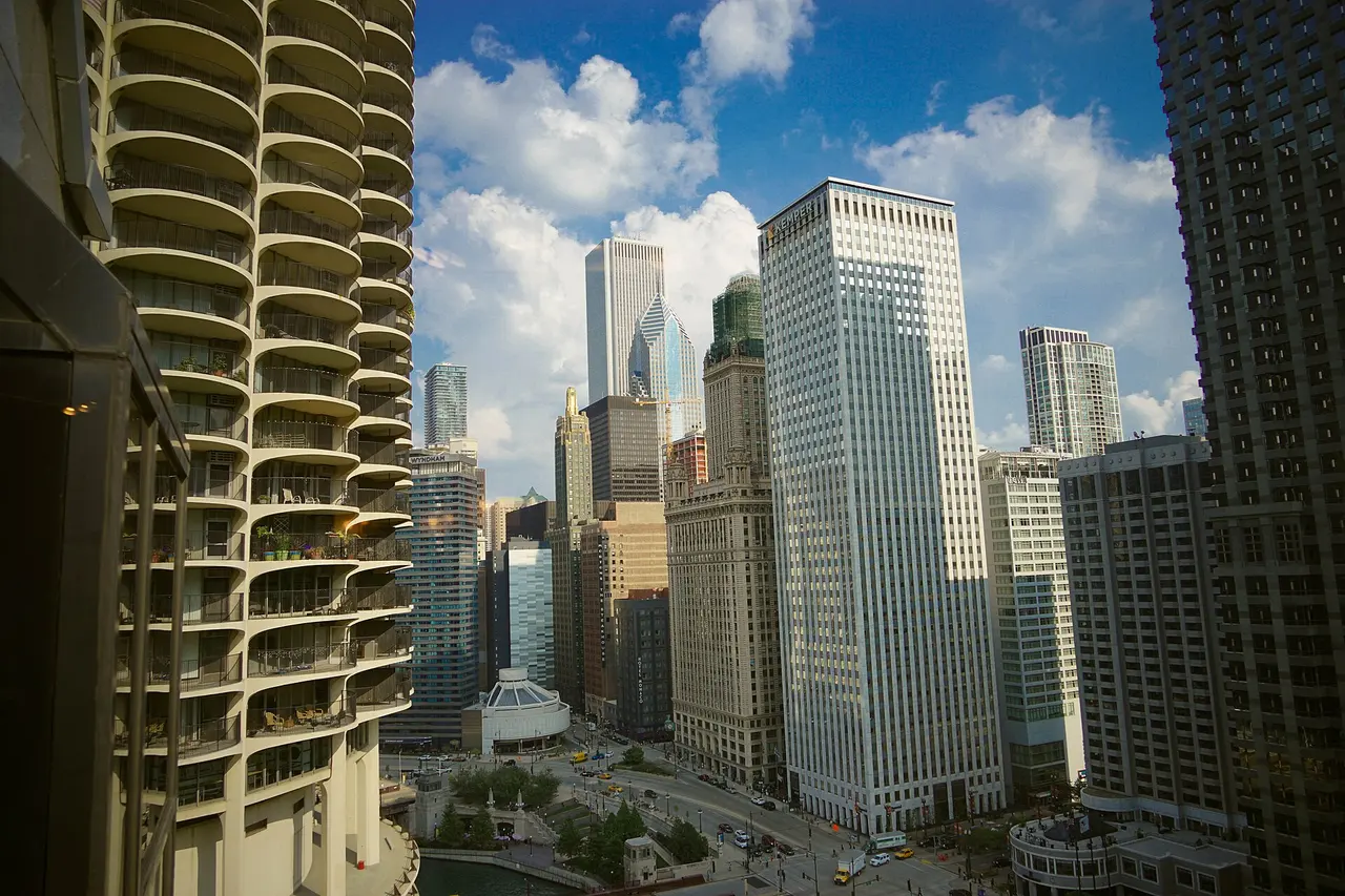 Marina City's round balconied towers beside downtown Chicago high-rises