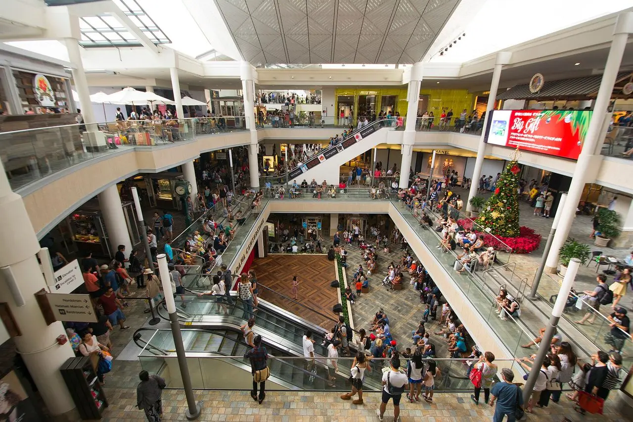 Shoppers around the open-air center stage at Ala Moana Center in Honolulu
