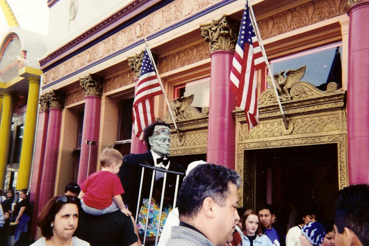 Crowds and shopfronts along Hollywood Boulevard near the Walk of Fame