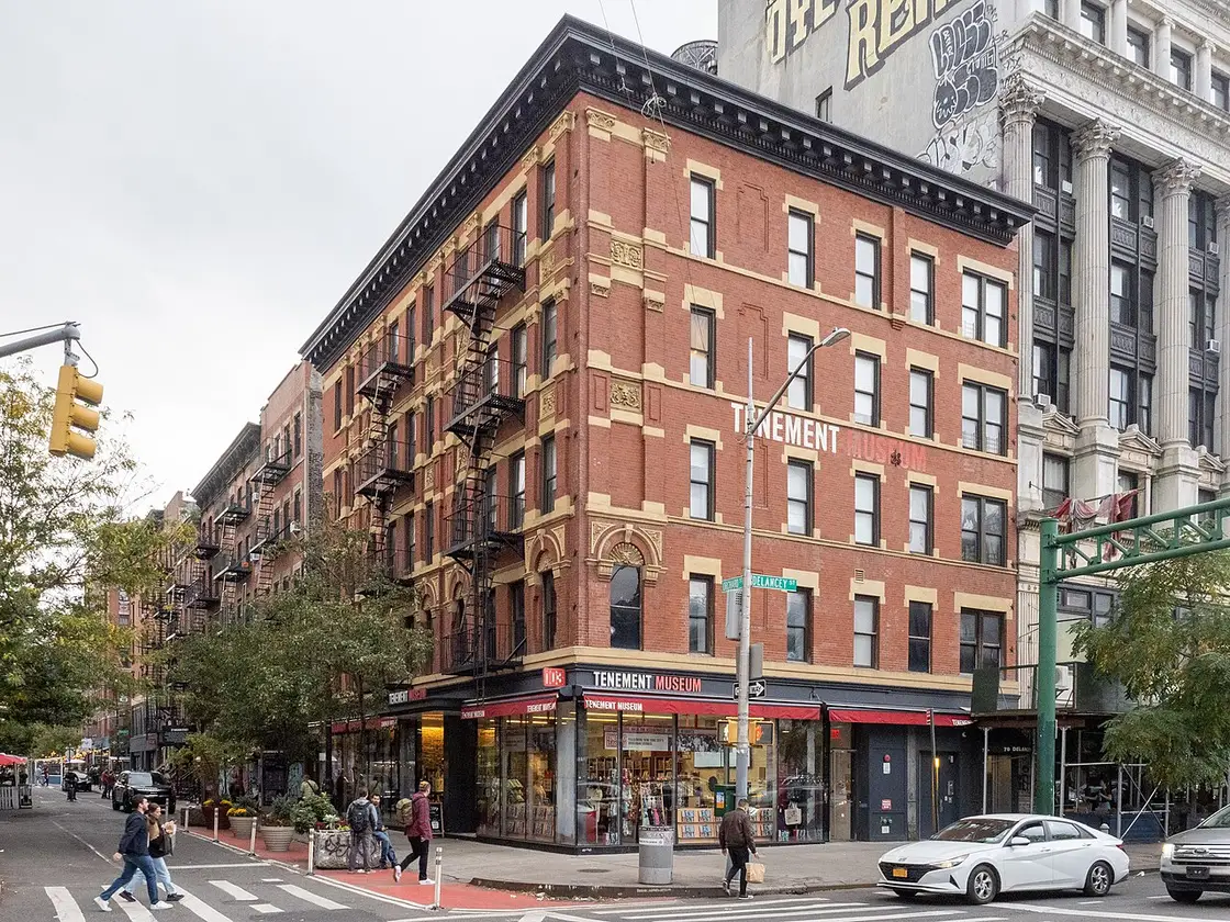 A red-brick tenement building housing the Tenement Museum on Orchard Street in the Lower East Side