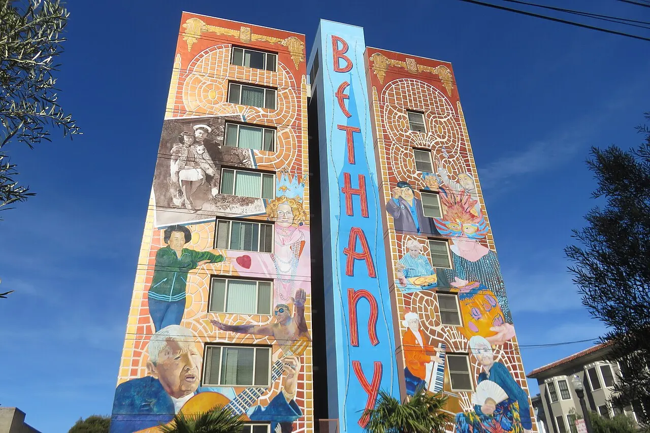 A large painted political mural on a wall in the Mission District of San Francisco