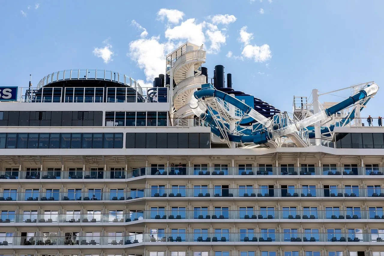 The upper decks of a large cruise ship berthed at Pier 66 on the Seattle waterfront