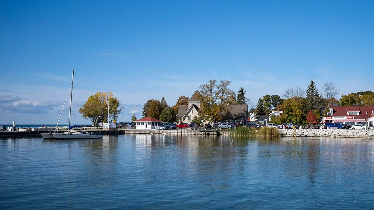 Wooden docks and small boats along the calm harbor at Ephraim in Door County, Wisconsin
